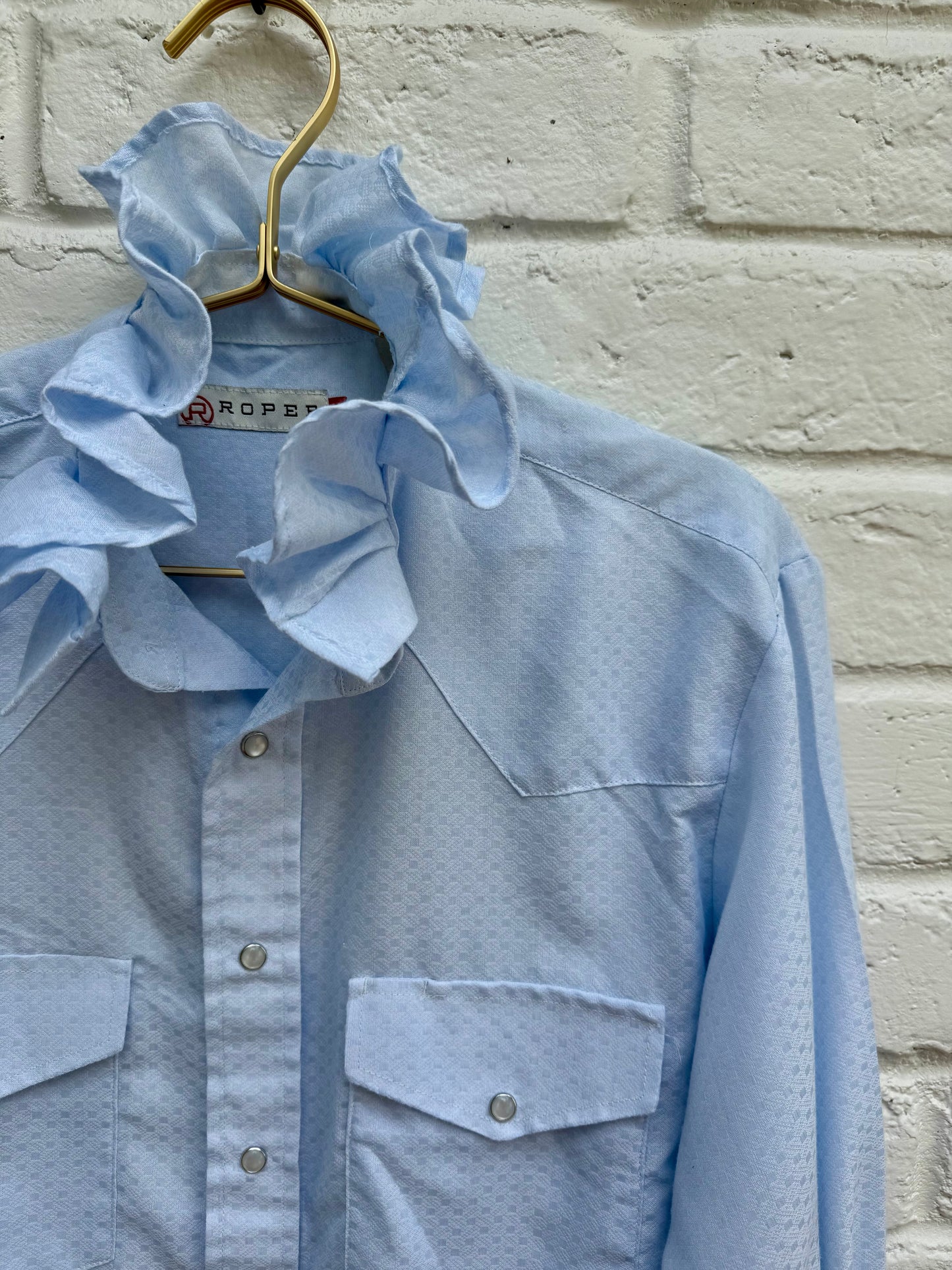 Vintage Roper Light Blue Ruffle Collar Western Pearl Snap Shirt Retro Cowgirl- Size S. Measures 20” from pit to pit.