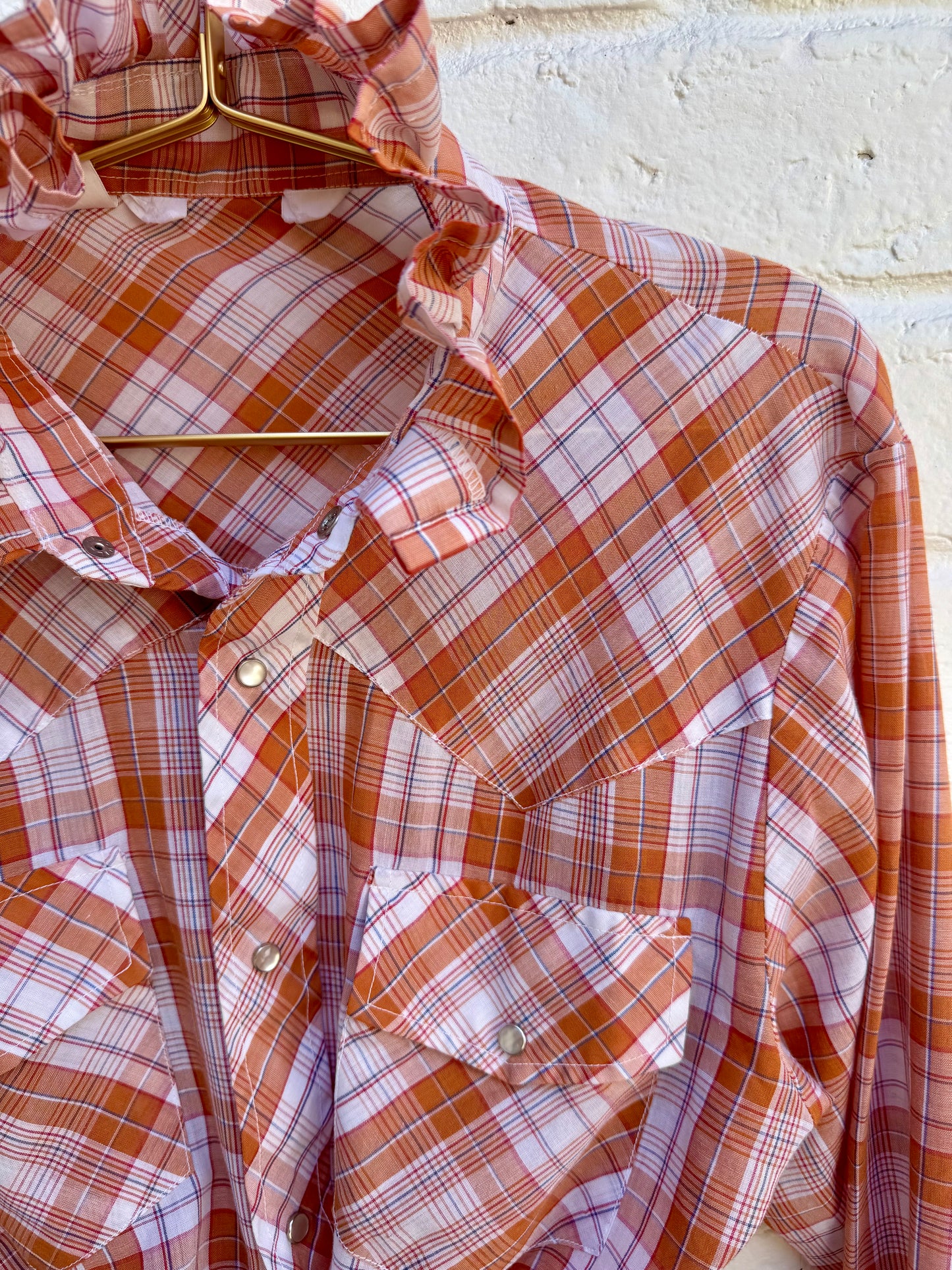 Revamped Vintage Long Sleeve Plaid Ruffle Western Pearl Snap Shirt - Terracotta Orange & Cream| Measures 19” at the chest. 24.5” sleeves.