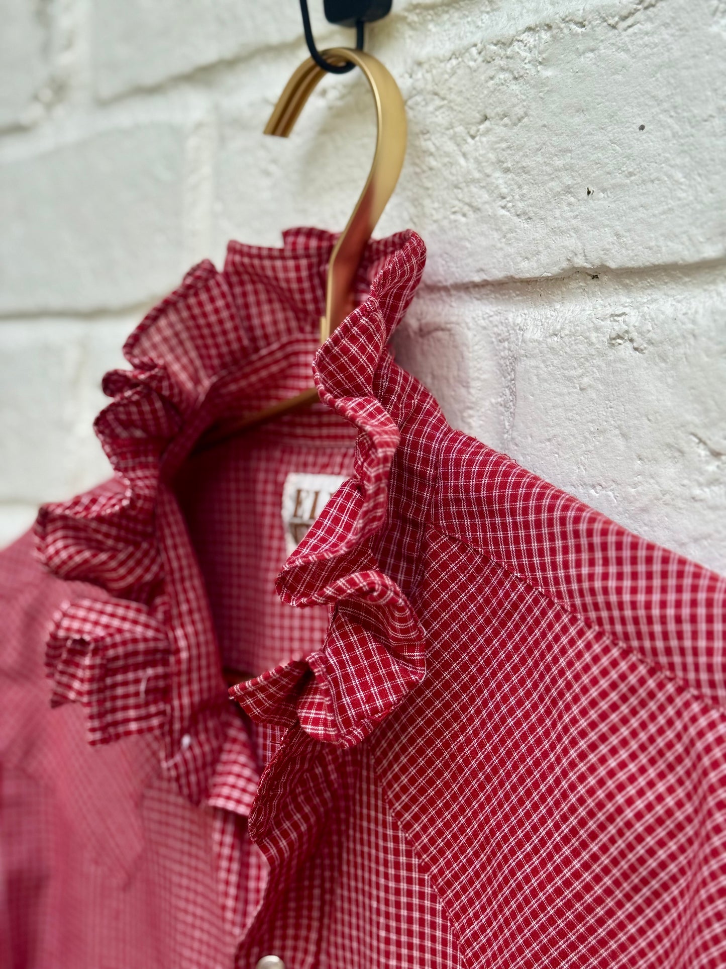 Vintage Ely Cattleman Men's Red Gingham Western Pearl Snap Shirt Short Sleeve S. Measures 19.5” pit to pit.