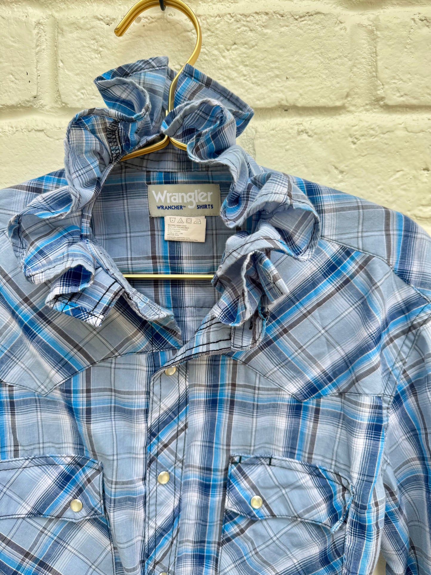 Upcycled Wrangler Blue Plaid Western Pearl Snap Ruffle Shirt – Women’s Reworked Button Down Chest: 20” Sleeves: 24”