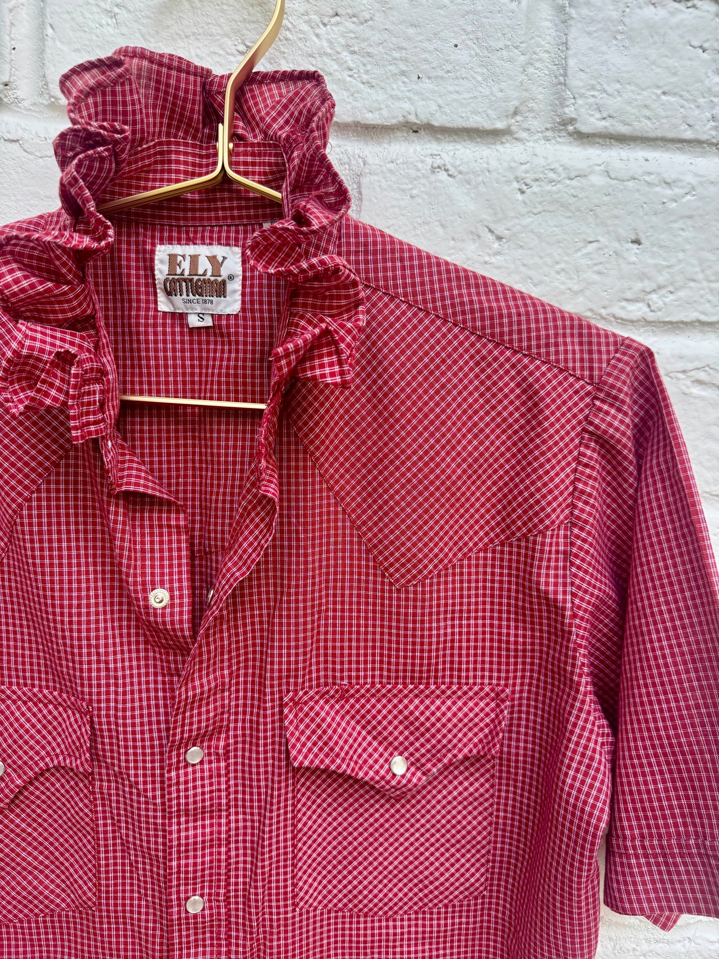 Vintage Ely Cattleman Men's Red Gingham Western Pearl Snap Shirt Short Sleeve S. Measures 19.5” pit to pit.