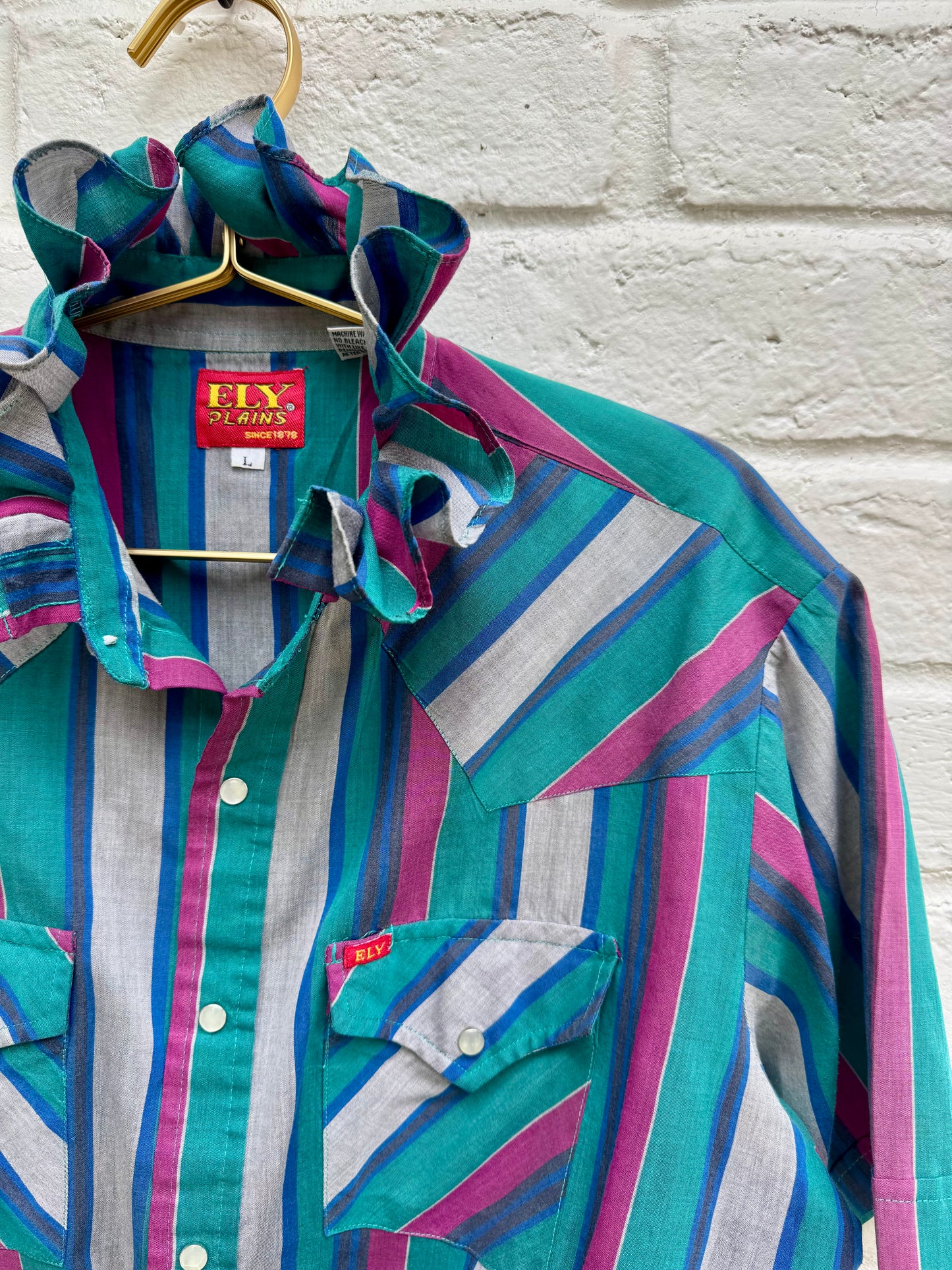 Vintage Ely Plains Striped Ruffle Collar Western Pearl Snap Shirt Teal Magenta L- Measures 24” pit to pit.