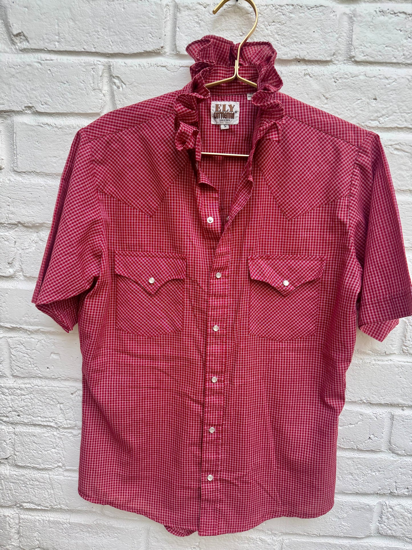 Vintage Ely Cattleman Men's Red Gingham Western Pearl Snap Shirt Short Sleeve S. Measures 19.5” pit to pit.