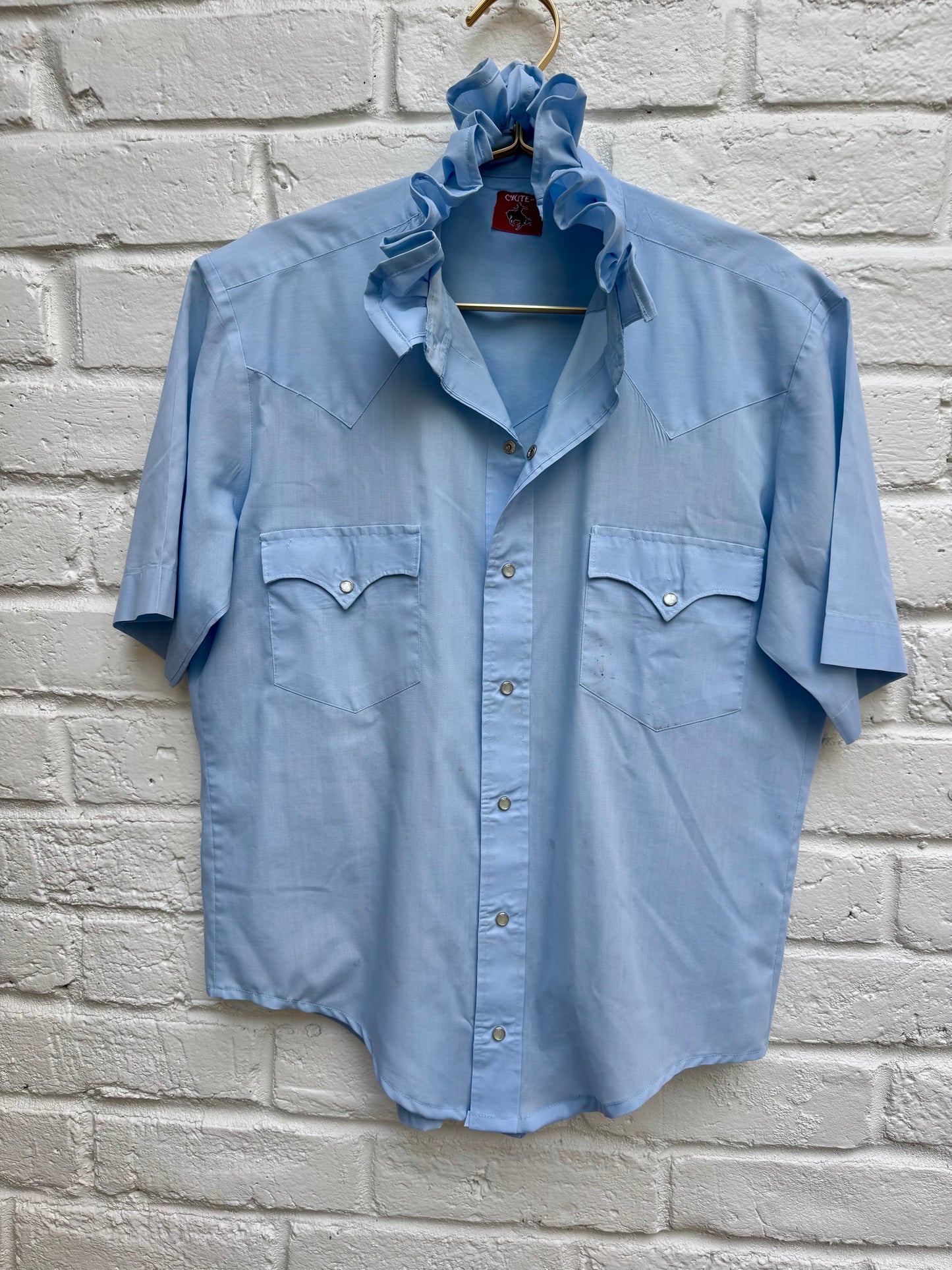 Vintage Chute #1 Men's Light Blue Solid Western Pearl Snap Shirt Short Sleeve. Measures 20” pit to pit.